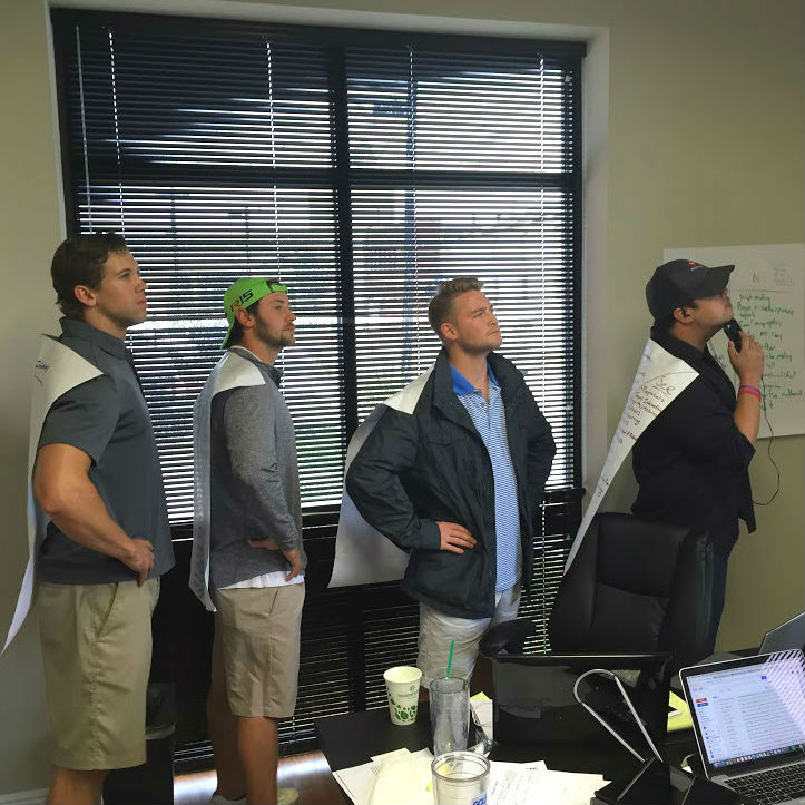 SDR-Team-in-Office-Capes-and-all-600